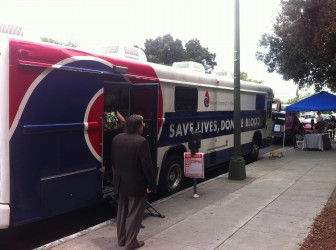 A mobile blood bank parked just outside the county building.