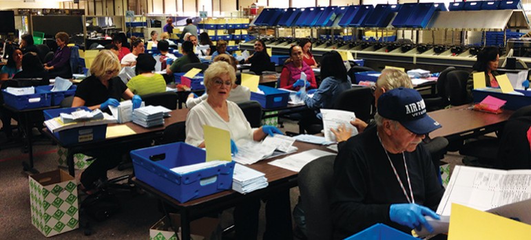 County employees worked 12-hour shifts each day last week to sort and count the 140,000-plus vote-by-mail ballots.